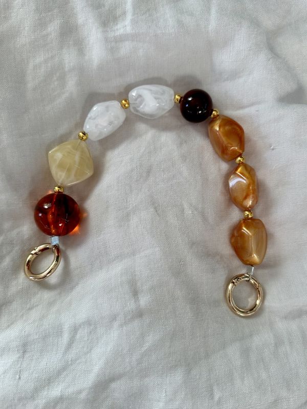 Perler på en snor - Asta